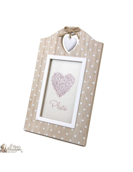 Photo frame with wooden heart motifs
