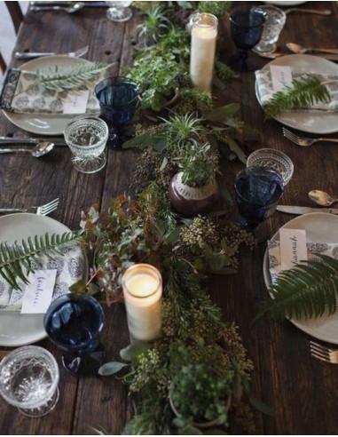 Witte waskaars in glazen houder