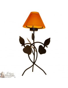 Bougeoir en fer forgé avec pommes et verre orange