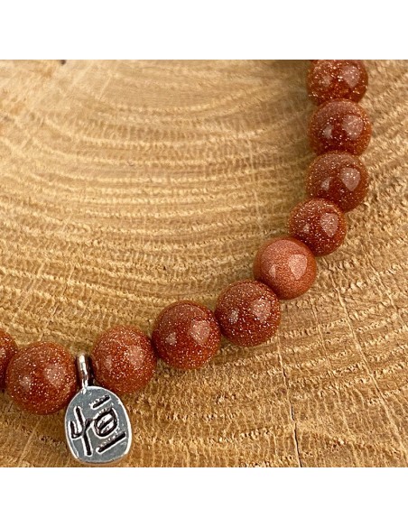 Bracelet en perles de gold stone