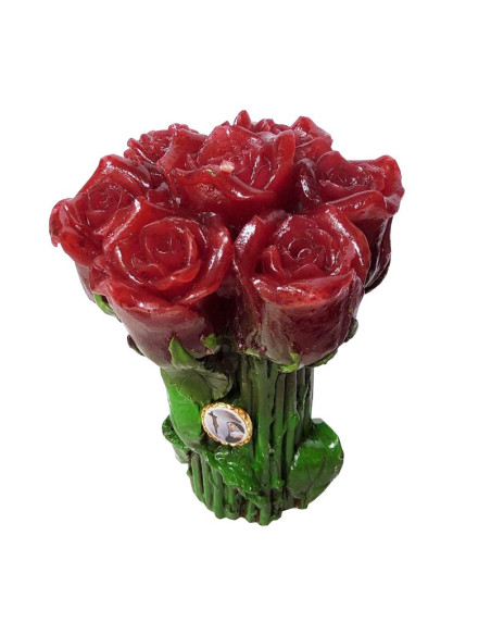 Kerze mit roten Rosenblüten und Sainte-Thérèse-Anstecknadeln