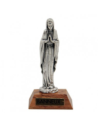 Virgin Mary statue on a wooden base